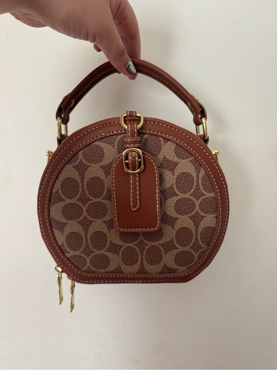 Handbags - NWOT Brown Signature Round Bag